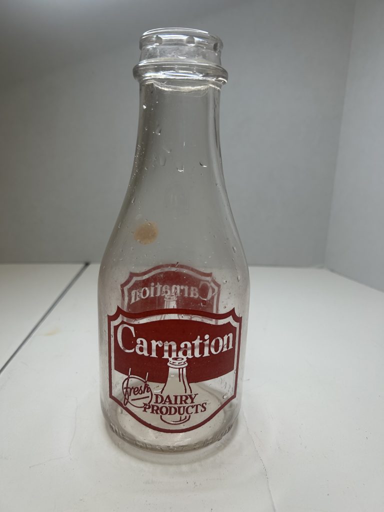 1947 Carnation glass milk bottle red and white